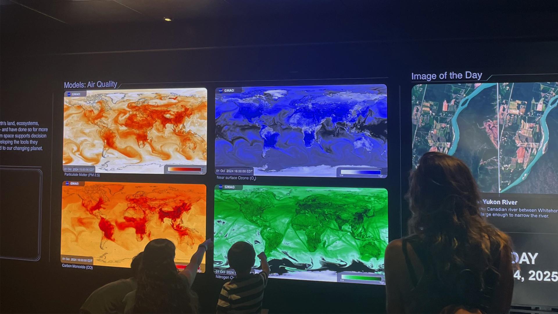 The Earth Information Center's Hyperwall displaying air quality data at the Frost Museum of Science.